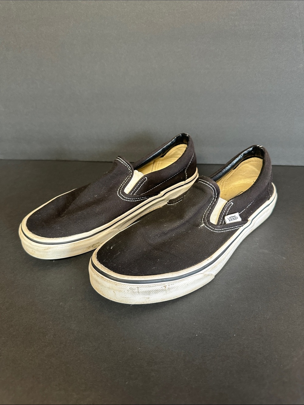 Vans black and white slip on shoes men’s size 8/ women’s size 9.5